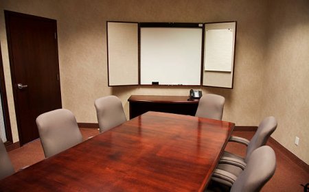Executive-Style Boardroom Suites for High-Level Meetings